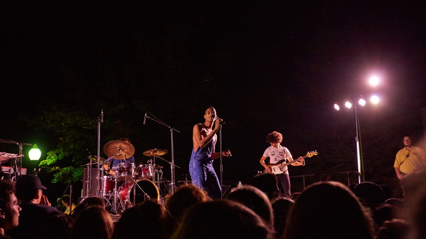 Music performance on an outdoor stage.