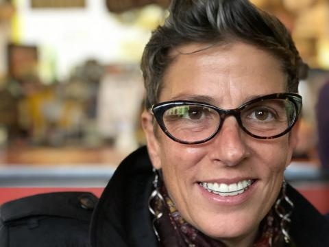 headshot of Jennifer Fraser smiling with glasses