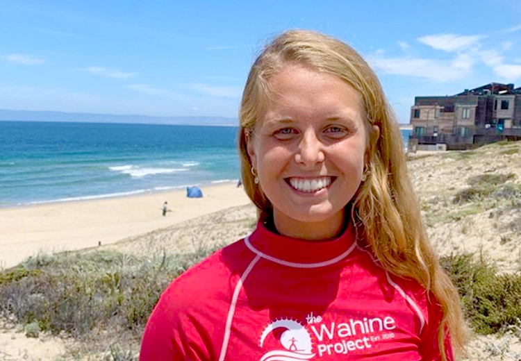 Maddy Springfield Standing on a beach and smiling