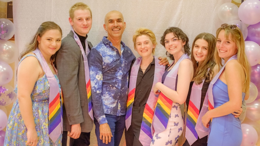 Students and faculty pose at lavender graduation.