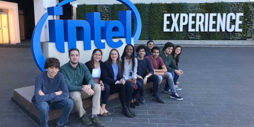 10 Middlebury students seated on the Intel logo outside of the Intel headquarters in San Francisco.