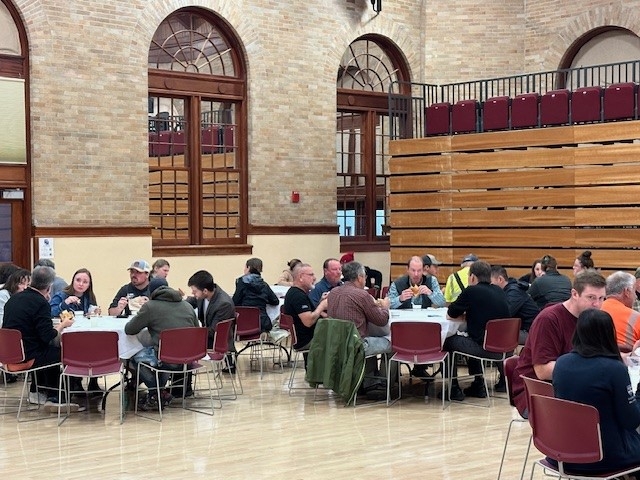 Employees sitting together enjoying Lunch together