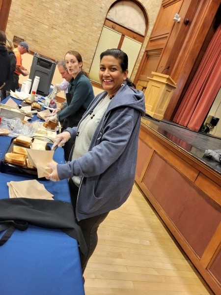 Employees making grilled cheese