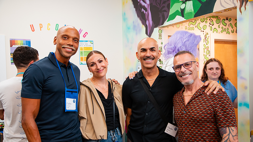Friends from the classes of 1990 and 2000 at the LGBT+ mixer at the Prism Center during Reunion 2025