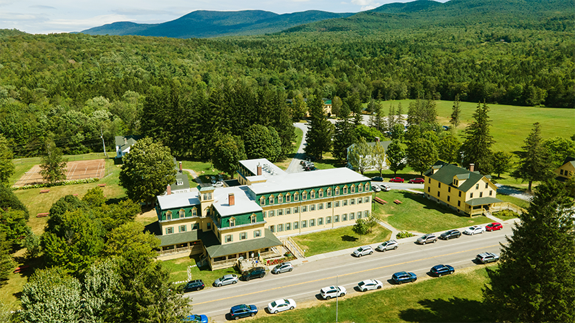 Aerial view of the Bread Loaf Inn and surrounding buildings in on a sunny late summer day