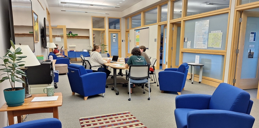 Bright room with students at table