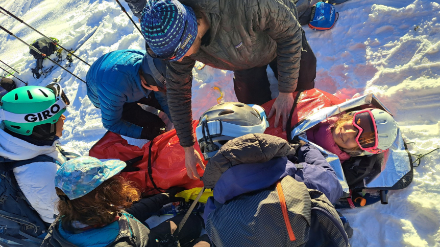 Students building an emergency litter