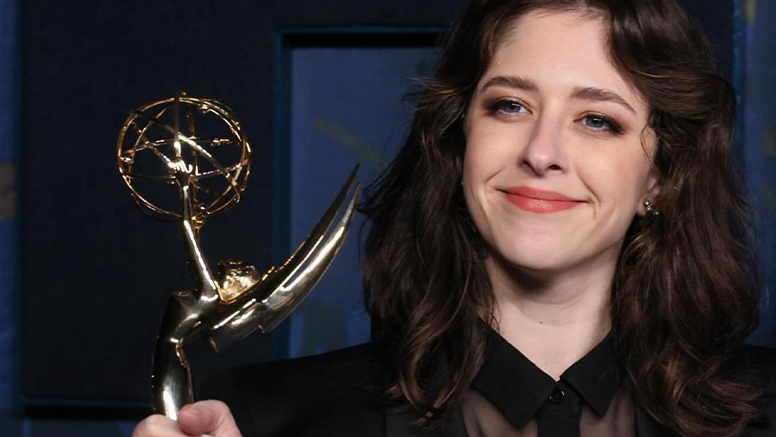 Joanna Rothkopf holding Award