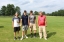 team photo from employee golf tournament