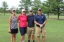 team photo from employee golf tournament