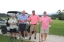 team photo from employee golf tournament