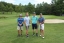 team photo from employee golf tournament