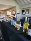 Bartender serving drink to customer