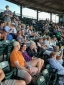 Group of Middlebury Employees sitting in the stands at Centennial Field waiting for the game to start.