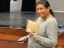 And employee with grilled cheese smiling
