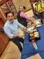 Employees making grilled cheese
