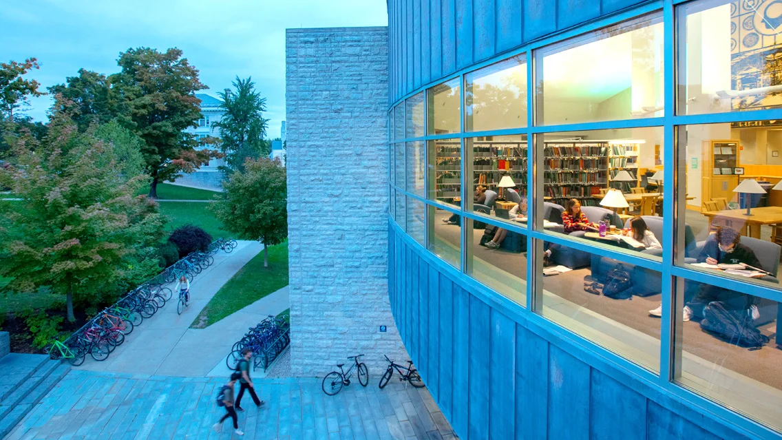 Looking through Davis Family Library at studying students.