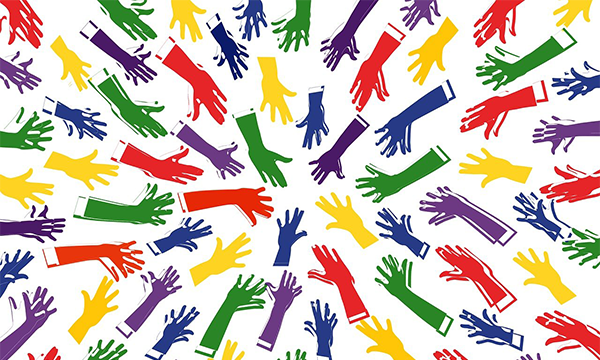 a rainbow of hands reaching towards each other