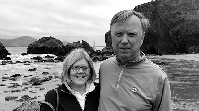 a black-and-white photo of Ann & Richard Crumb at a rocky California beach