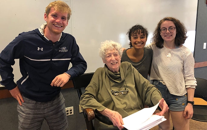 Students (left to right) Adam Fisher ’19, Kaila Thomas ’21, and Talia Rasiel ’22 stand with Lore Segal after she gave a reading of some recent works.