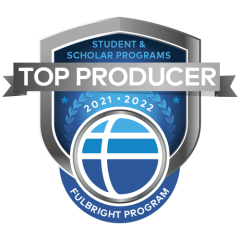 Fulbright logo of blue ball with shield behind