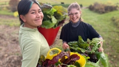 Previous Climate Action Fellows Remi Welbel ‘22.5 and CJ (Christine) Nabung ‘22.5 show off some abundant produce from the Knoll.