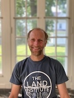 image of a man Marc in a "The Land institute" graphic t-shirt