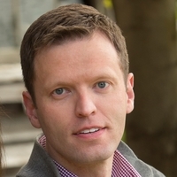 Close up of Brandon Baird in check shirt