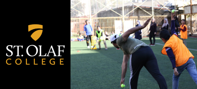 Text St Olaf College in white and yellow underneath a yellow logo all on a black background beside a photo of an adult and a child pitching in cricket.
