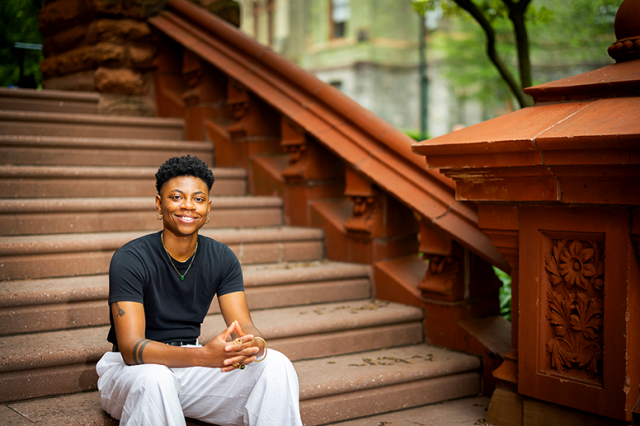 Tamir Williams ’16 sitting on steps