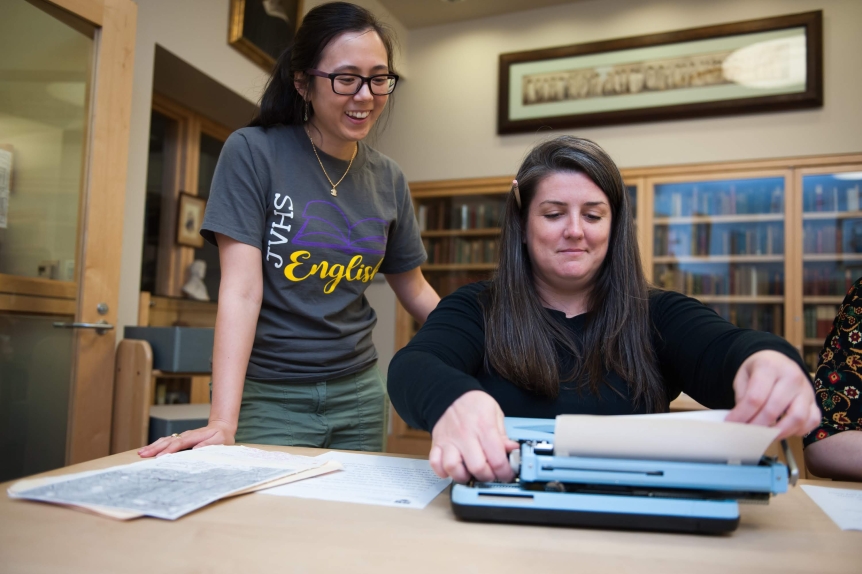 Students use a vintage typewriter in a Special Collections “Writing Lab.”