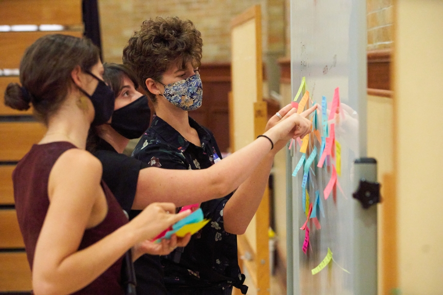 Students share ideas at the Clifford Symposium