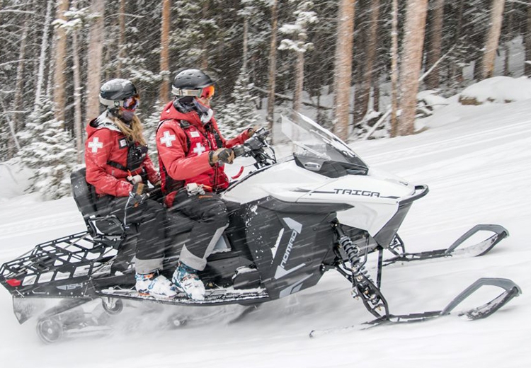 Two People On a Snowmobile