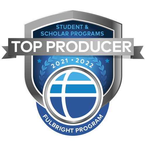 Fulbright logo of blue ball with shield behind