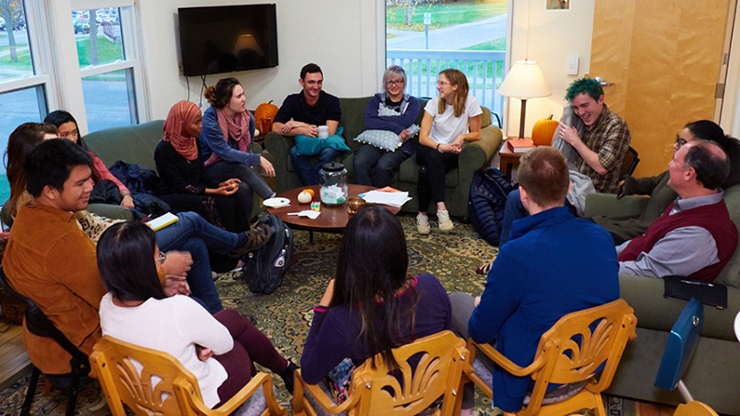 Students in a talking circle at the interfaith house