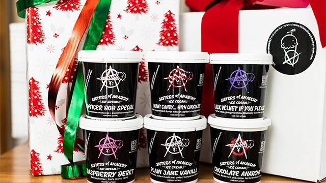 six containers of different flavors of Sisters of Anarchy ice cream 