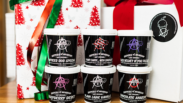 six containers of different flavors of Sisters of Anarchy ice cream