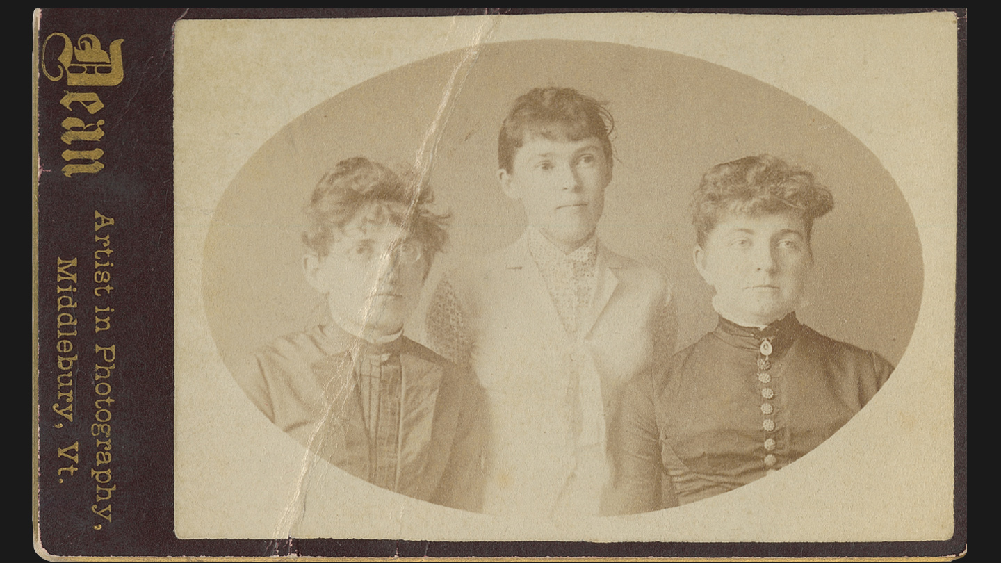 May Bell Chellis and two other grads
