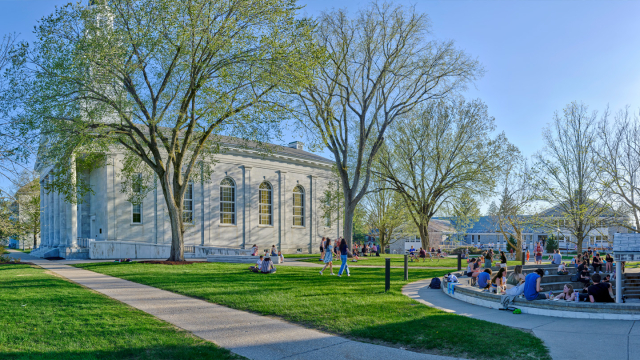 Photo of students enjoying campus on a spring day.
