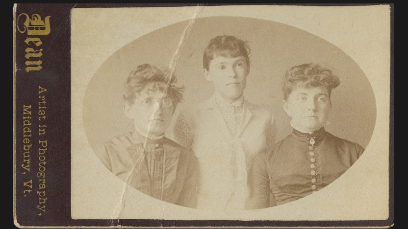 May Bell Chellis and two other grads