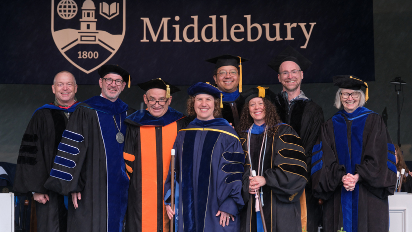 A group of faculty and administrators onstage at Commencement.