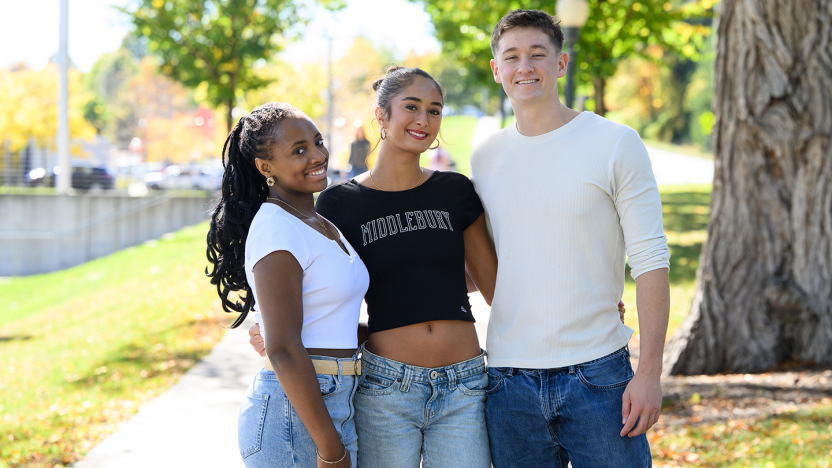 Three students pose for a photo
