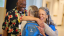 Two people hug at Middlebury College Reunion.
