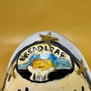 painted bread loaf sign on wooden egg