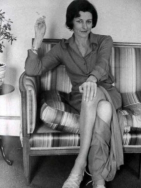 Anne Sexton sitting on couch
