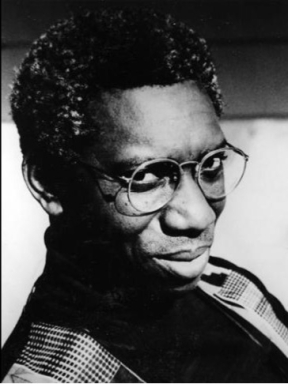 Yusef Komunyakaa looking at camera