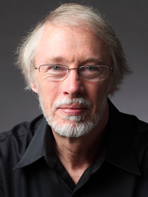 Charles Baxter looks at camera