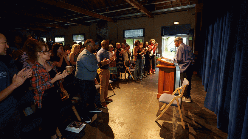 Yusef Komunyakaa receives a standing ovation in the Little Theater.