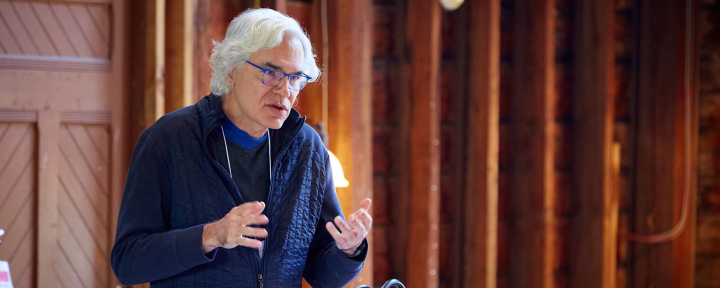Faculty member Hosam Aboul-Ela offers a lecture in the Barn on the Bread Loaf campus.